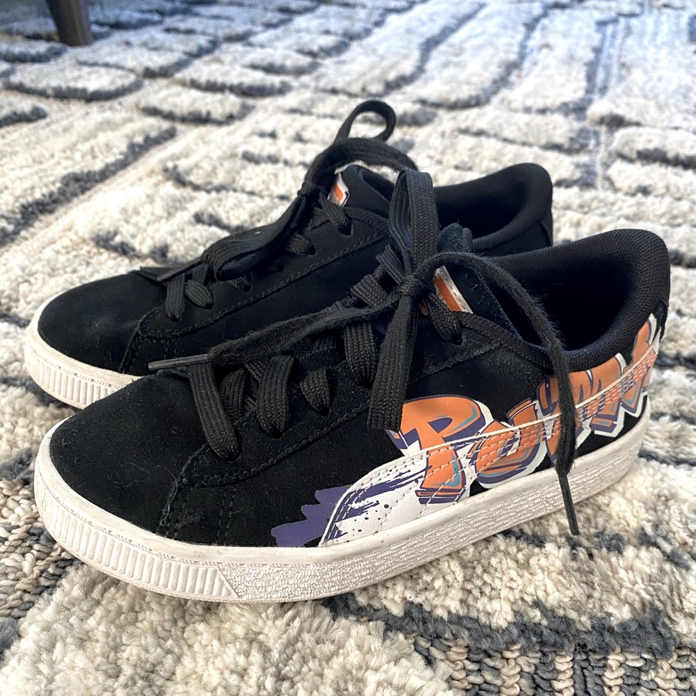 Original Puma boys black suede sneakers. Worn very little. Graffiti design